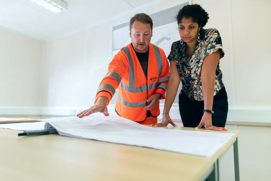 Engineers coordinating project documentation and workflow support